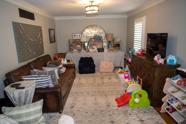 living room featuring crown molding