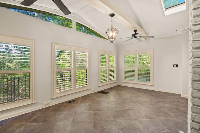 unfurnished sunroom with lofted ceiling, a skylight, and a chandelier