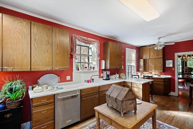 14 Morningside Pl, Memphis, TN 38104 - kitchen with stainless steel dishwasher, plenty of natural light, wood finished floors, and crown molding