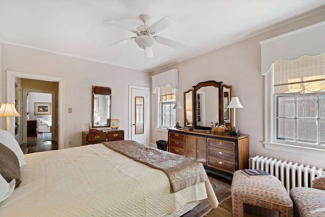 14 Morningside Pl, Memphis, TN 38104 - bedroom featuring radiator heating unit, dark wood-style flooring, and ceiling fan