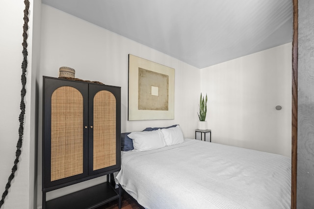 bedroom with wood finished floors