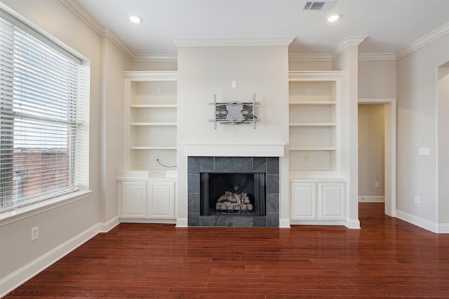 510 Cityhouse Ct Unit 406, Memphis, TN 38103 - unfurnished living room with healthy amount of natural light, baseboards, a tiled fireplace, crown molding, and recessed lighting