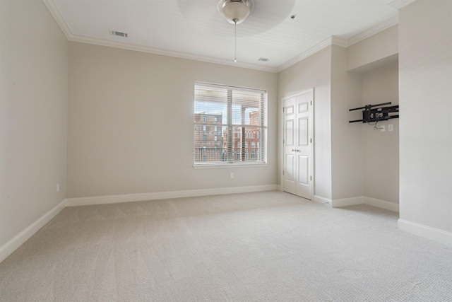 510 Cityhouse Ct Unit 406, Memphis, TN 38103 - spare room with ornamental molding, light carpet, ceiling fan, and baseboards