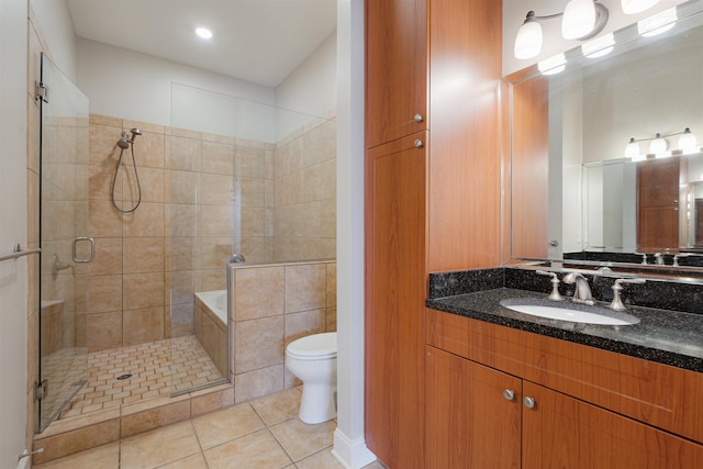 510 Cityhouse Ct Unit 406, Memphis, TN 38103 - bathroom with a shower stall, tile patterned flooring, toilet, and vanity