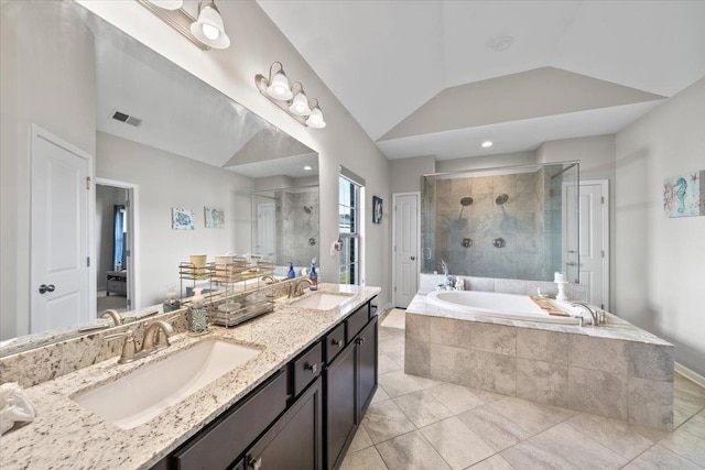 40 Chesnut Spring Dr, Oakland, TN 38060 - bathroom featuring a shower stall, tile patterned floors, a bath, lofted ceiling, and double vanity