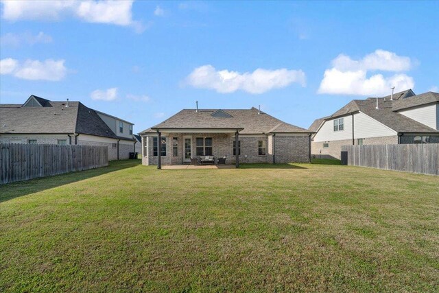 40 Chesnut Spring Dr, Oakland, TN 38060 - back of house with a patio area