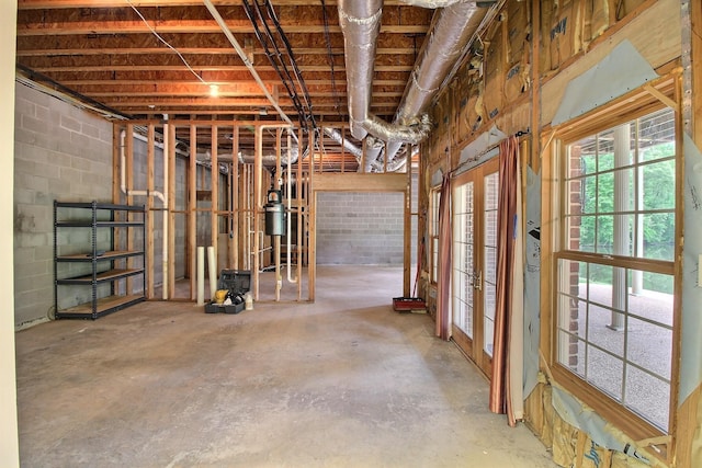 basement featuring concrete block wall