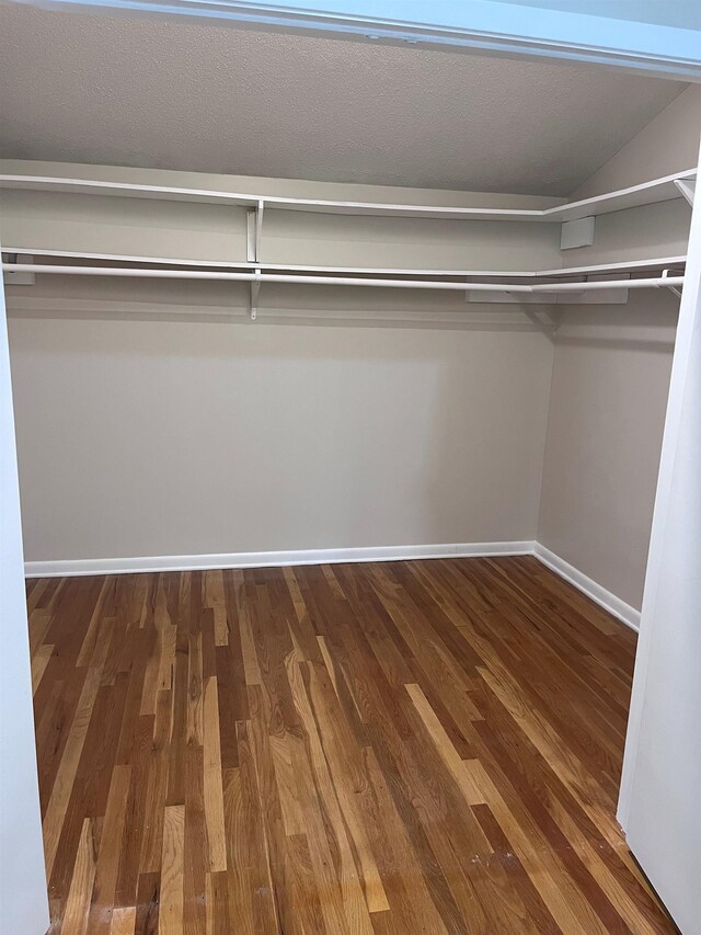 2902 Capri St, Memphis, TN 38118 - spacious closet featuring wood finished floors