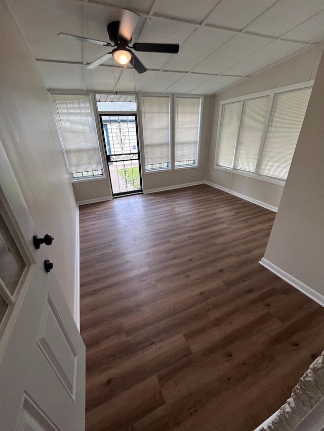2902 Capri St, Memphis, TN 38118 - unfurnished room featuring baseboards, dark wood-style flooring, and a ceiling fan
