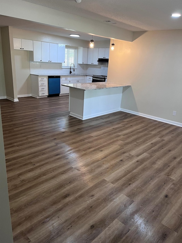 2902 Capri St, Memphis, TN 38118 - kitchen with dishwasher, a peninsula, baseboards, white cabinets, and a sink