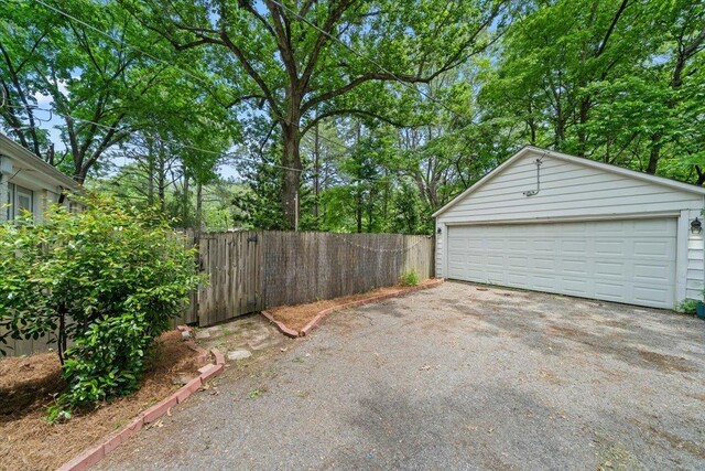 detached garage with fence