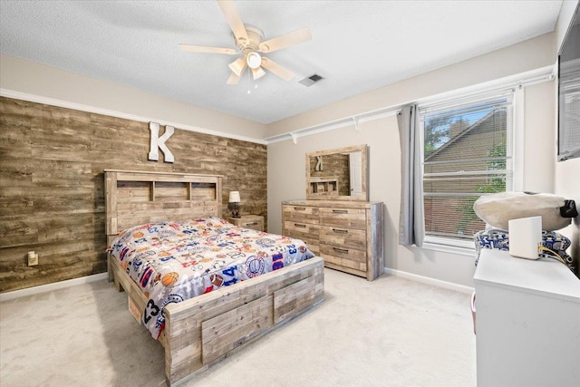 8606 Meadow Green Dr, Memphis, TN 38016 - bedroom featuring light colored carpet, baseboards, and a ceiling fan