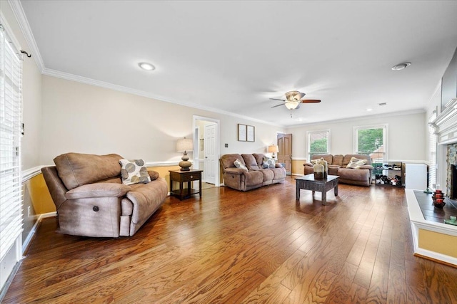 8606 Meadow Green Dr, Memphis, TN 38016 - living room with a fireplace, ceiling fan, hardwood / wood-style floors, crown molding, and baseboards
