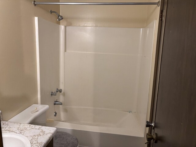 full bathroom featuring shower / tub combination, toilet, and vanity