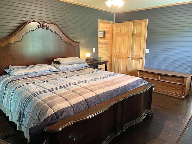 4560 Bishop Rd, Middleton, TN 38052 - bedroom featuring wood-type flooring and wood walls