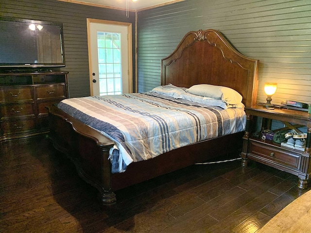 4560 Bishop Rd, Middleton, TN 38052 - bedroom with dark wood-style flooring and wood walls