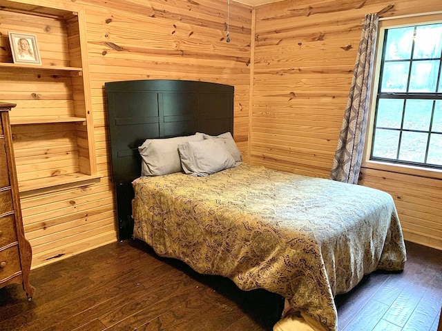 4560 Bishop Rd, Middleton, TN 38052 - bedroom with dark wood-type flooring and wood walls