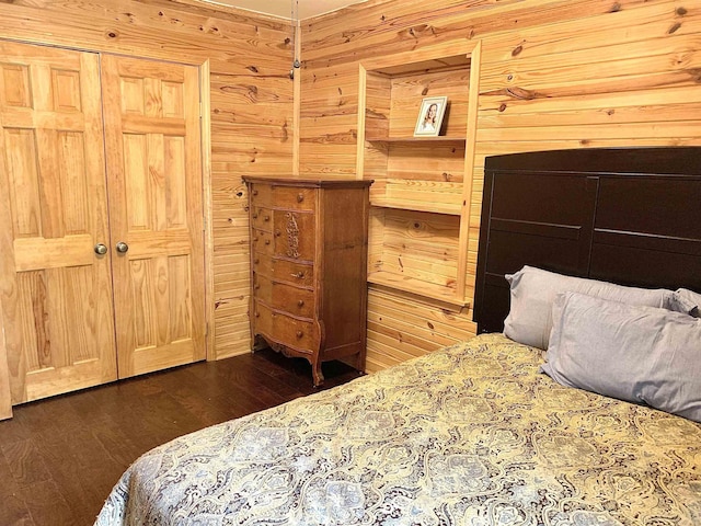 4560 Bishop Rd, Middleton, TN 38052 - bedroom with wood walls and dark wood finished floors