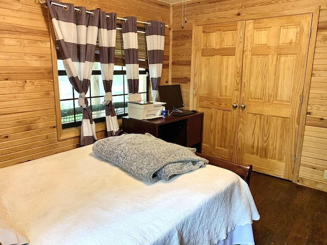 4560 Bishop Rd, Middleton, TN 38052 - bedroom featuring wooden walls and wood finished floors
