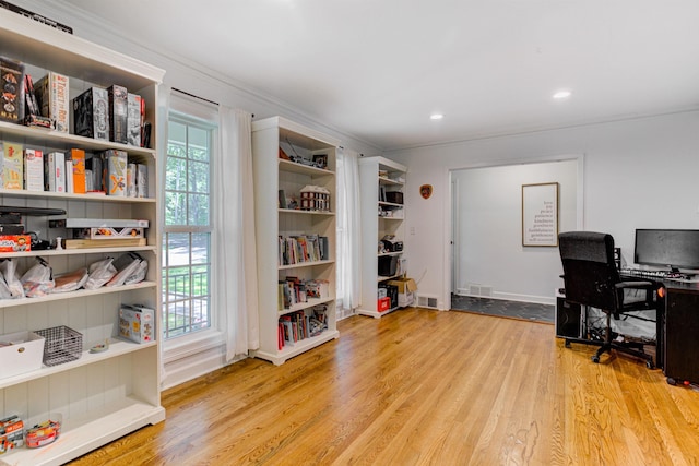 office space with wood finished floors, crown molding, recessed lighting, and baseboards