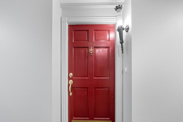 doorway to property with stucco siding