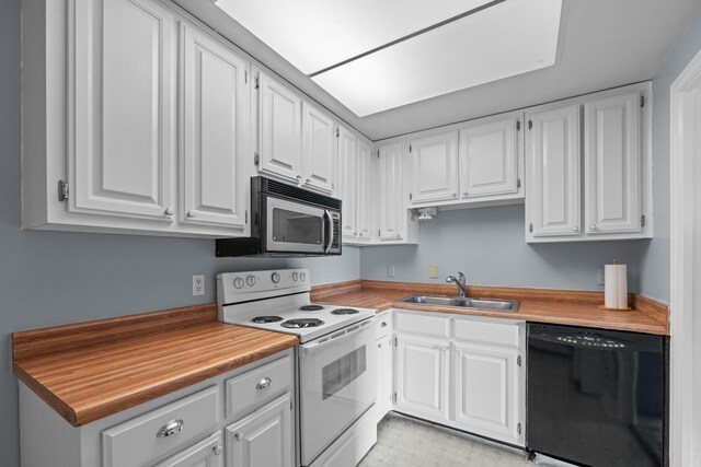 kitchen with dishwasher, white range with electric cooktop, a sink, stainless steel microwave, and white cabinets