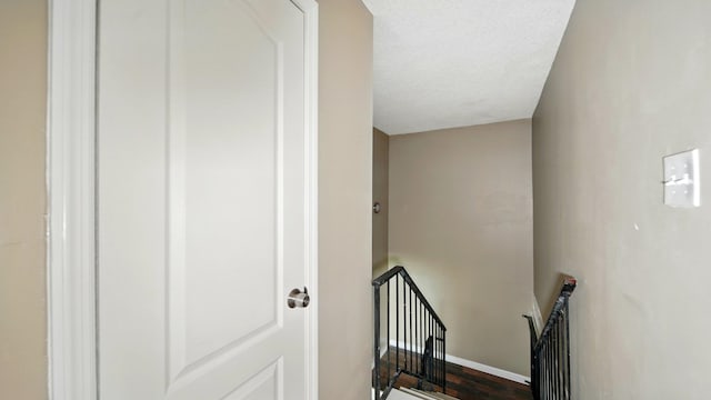 3554 Morning Dew Ct Unit 11, Memphis, TN 38118 - stairs featuring baseboards and a textured ceiling