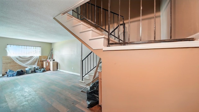 3554 Morning Dew Ct Unit 11, Memphis, TN 38118 - stairs with wood finished floors, baseboards, and a textured ceiling