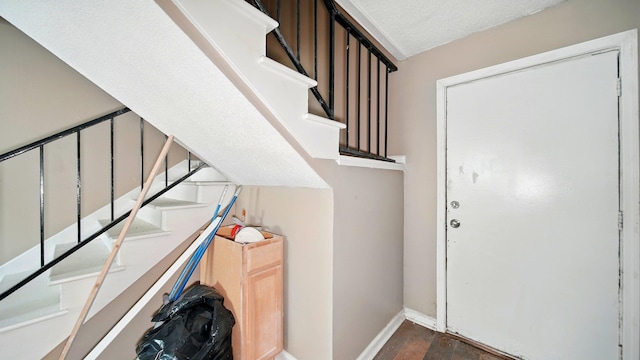 3554 Morning Dew Ct Unit 11, Memphis, TN 38118 - foyer with stairway, wood finished floors, and baseboards