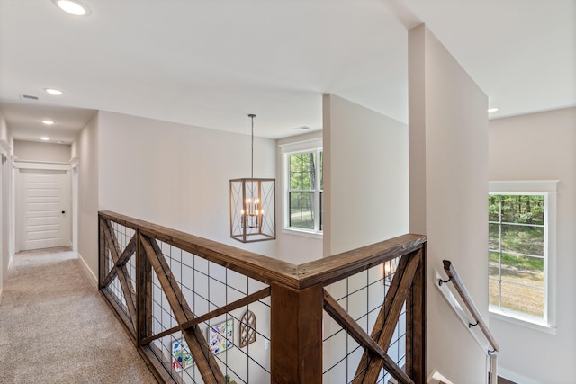 6978 Vaiden Rd, Hernando, MS 38632 - hallway featuring an upstairs landing, carpet, a chandelier, baseboards, and recessed lighting