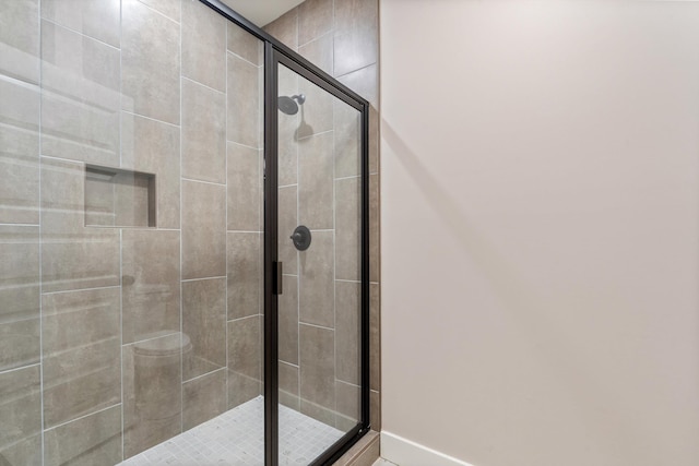 6978 Vaiden Rd, Hernando, MS 38632 - full bath with a stall shower and baseboards