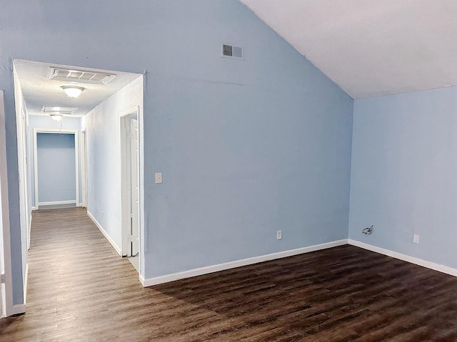 2345 Shasta Ave, Memphis, TN 38108 - additional living space with wood finished floors, vaulted ceiling, attic access, and baseboards