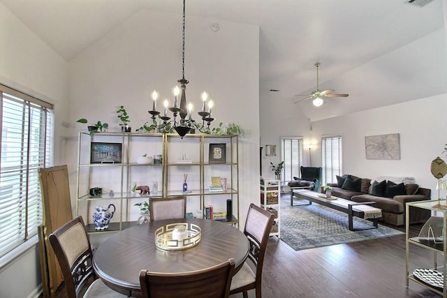 1079 River Isle Dr, Memphis, TN 38103 - dining space with healthy amount of natural light, high vaulted ceiling, wood finished floors, ceiling fan, and a chandelier