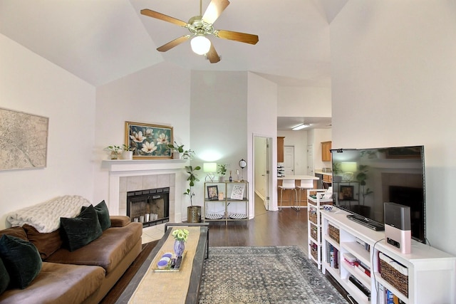 1079 River Isle Dr, Memphis, TN 38103 - living room with a fireplace, ceiling fan, wood finished floors, and high vaulted ceiling