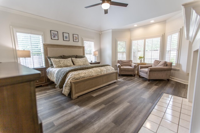 bedroom featuring ornamental molding, dark wood finished floors, recessed lighting, a ceiling fan, and baseboards
