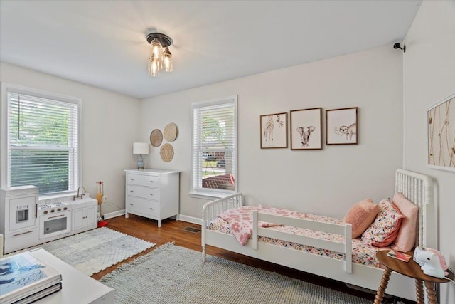 3686 Charleswood Ave, Memphis, TN 38122 - bedroom featuring wood finished floors and baseboards