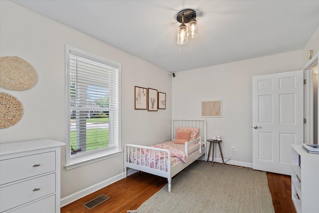 3686 Charleswood Ave, Memphis, TN 38122 - bedroom with wood finished floors and baseboards