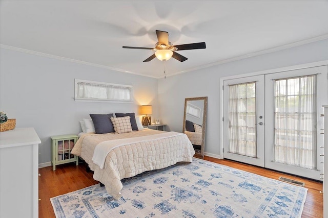 3686 Charleswood Ave, Memphis, TN 38122 - bedroom featuring access to exterior, french doors, crown molding, wood finished floors, and baseboards