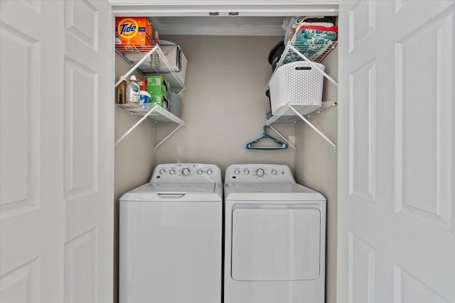 3686 Charleswood Ave, Memphis, TN 38122 - laundry area with washer and clothes dryer