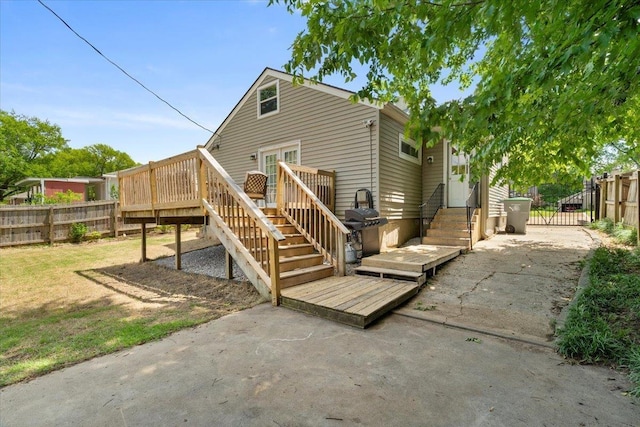 3686 Charleswood Ave, Memphis, TN 38122 - back of property featuring a deck, fence, a patio area, and stairway
