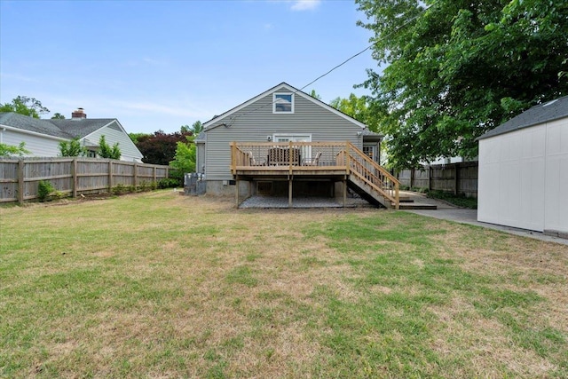 3686 Charleswood Ave, Memphis, TN 38122 - rear view of house with a wooden deck and stairs