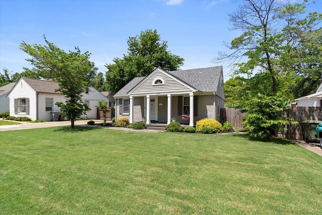 3686 Charleswood Ave, Memphis, TN 38122 - greek revival house with a porch, brick siding, and roof with shingles