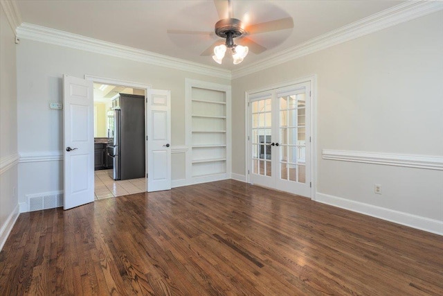 10336 Hatcher Patch Cv, Collierville, TN 38017 - unfurnished room featuring built in features, french doors, ornamental molding, wood finished floors, and ceiling fan