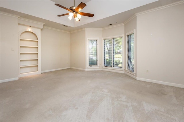10336 Hatcher Patch Cv, Collierville, TN 38017 - carpeted empty room with built in shelves, baseboards, a ceiling fan, and ornamental molding