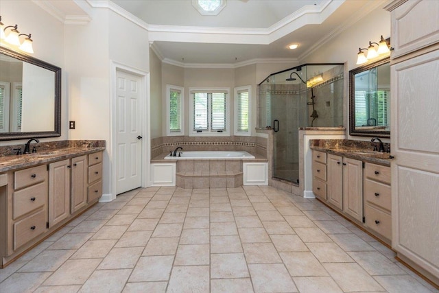 10336 Hatcher Patch Cv, Collierville, TN 38017 - bathroom featuring a shower stall, a garden tub, crown molding, and two vanities