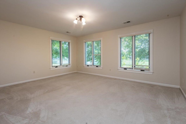 10336 Hatcher Patch Cv, Collierville, TN 38017 - spare room featuring light colored carpet and baseboards