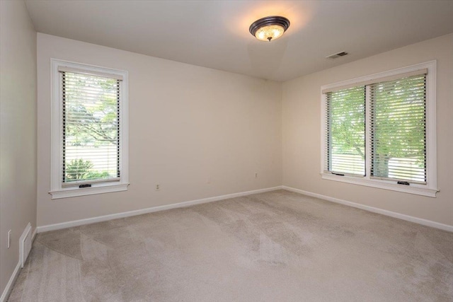 10336 Hatcher Patch Cv, Collierville, TN 38017 - unfurnished room featuring light carpet and baseboards
