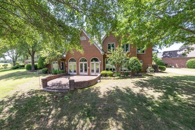 10336 Hatcher Patch Cv, Collierville, TN 38017 - rear view of property featuring french doors, brick siding, and a yard