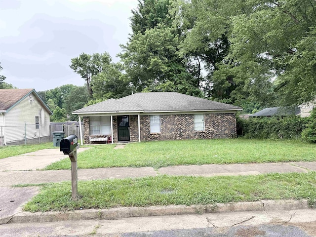 view of front of house featuring concrete driveway and brick siding