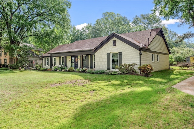 1366 Kirby Rd, Memphis, TN 38120 - ranch-style house with a front yard, brick siding, and a shingled roof